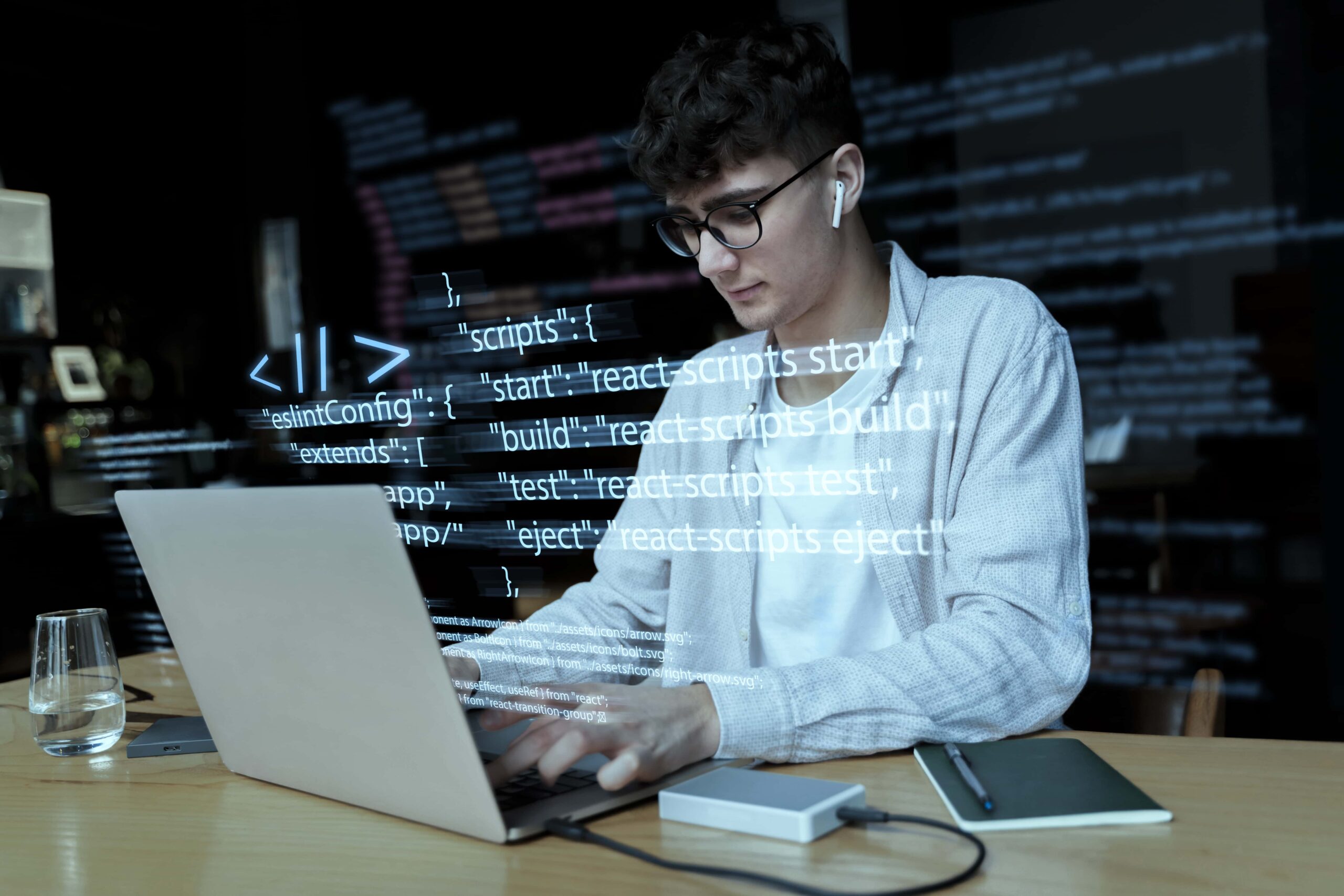 programming-background-with-person-working-with-codes-computer-min